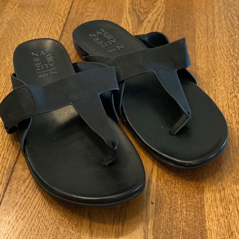 Woman’s Naturalizer black thong slip on sandal. Size 10.Velcro strap.Barely worn